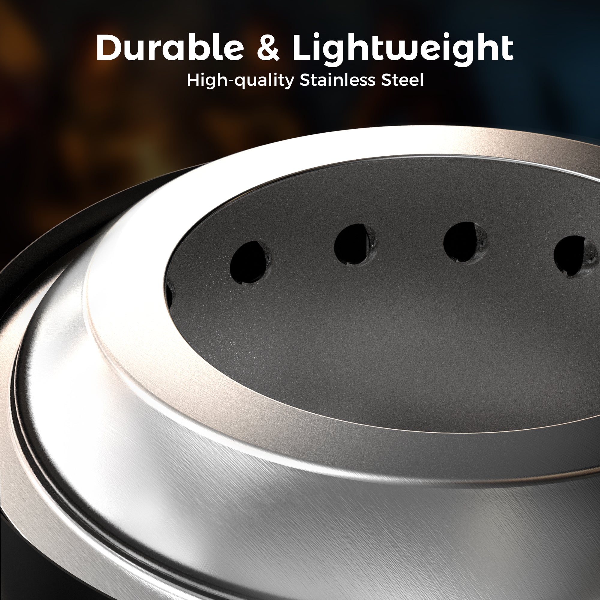 Black 6.5 inch wood stainless steel tabletop fire pit, close-up of brushed metal texture and air vents.