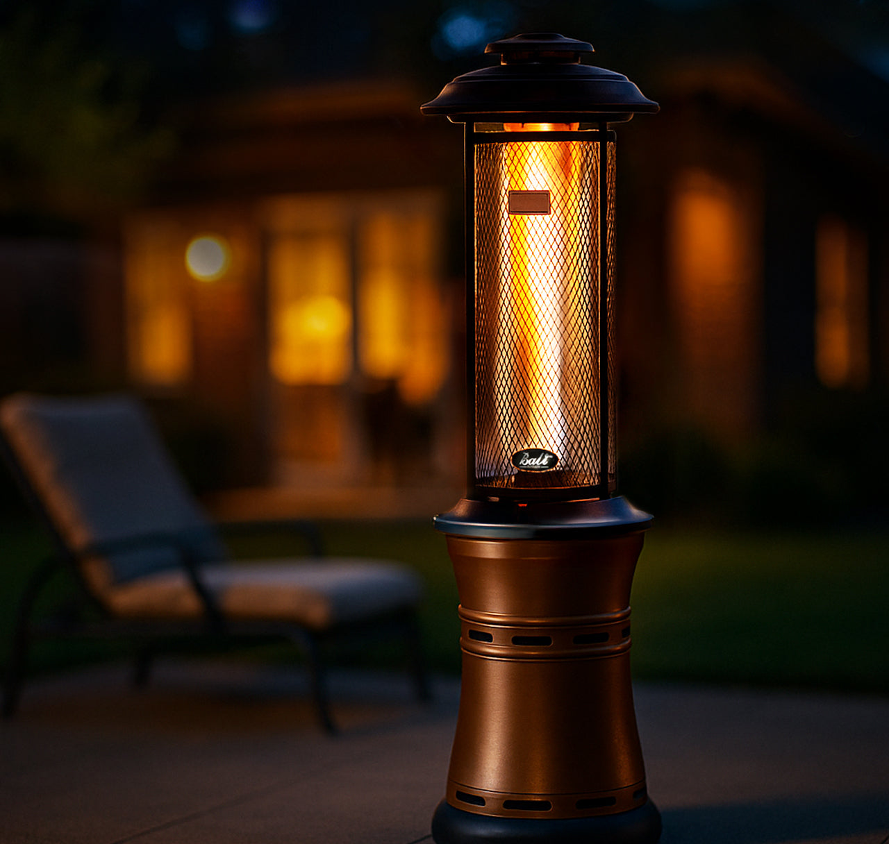 Bronze 20-inch patio propane heater with flame visible, set in an outdoor patio setting at dusk.