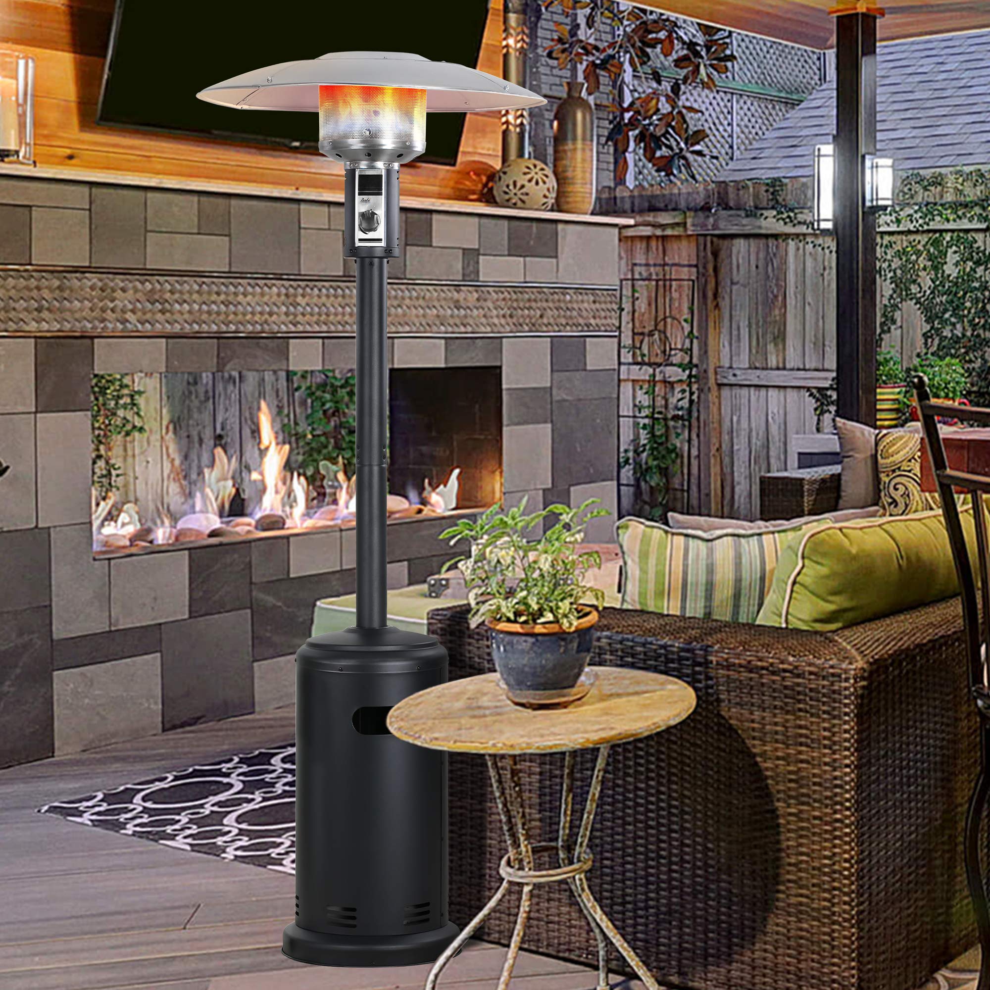 Black 32 inch propane patio heater with umbrella reflector, flames and adjustable knob on wooden deck with seating.