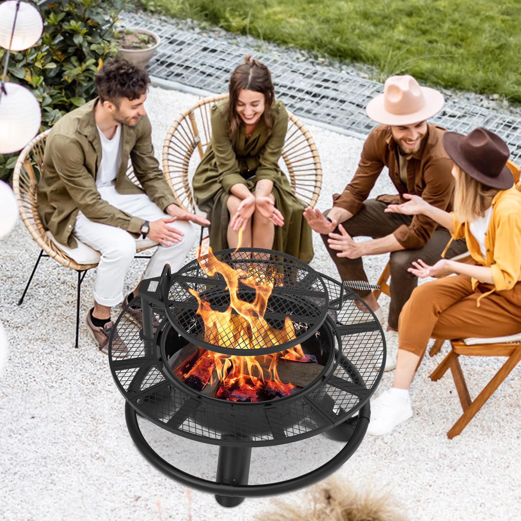Friends gathered around a 47-inch black wood fire pit with dual grill grates, enjoying a backyard barbecue.
