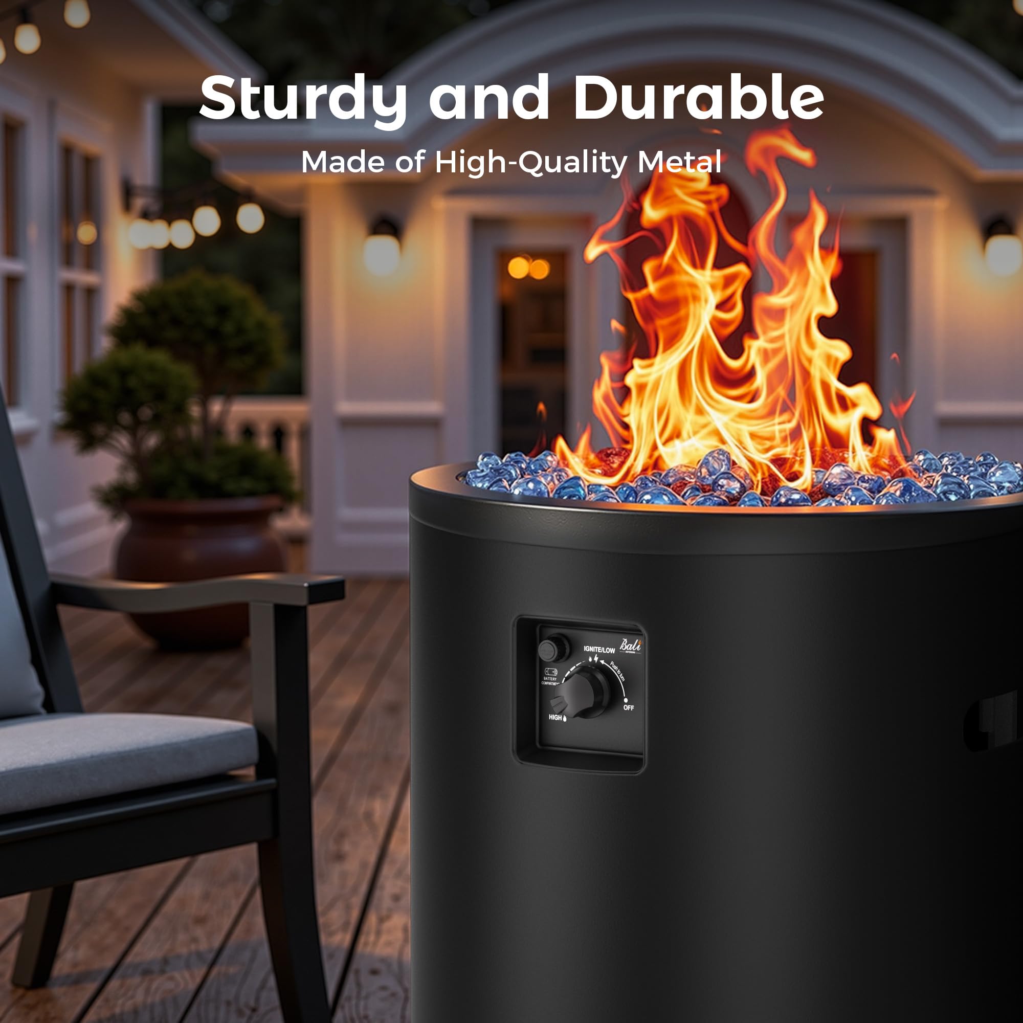 Black 23 inch propane fire pit with blue fire glass and adjustable flame control knob.