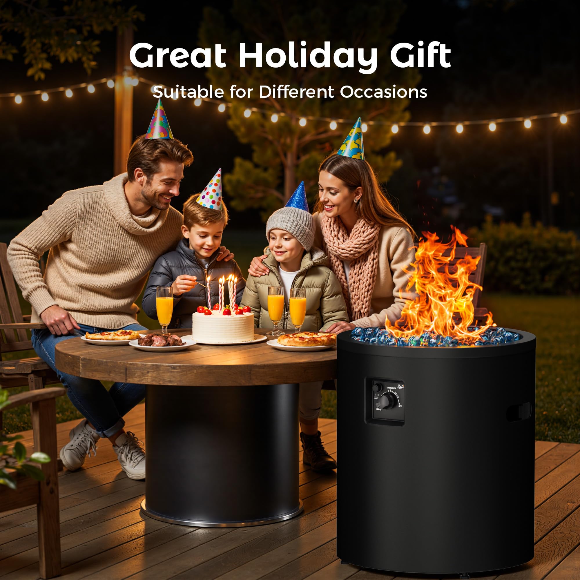 Black 23 inch propane fire pit with blue fire glass at family birthday party on patio.