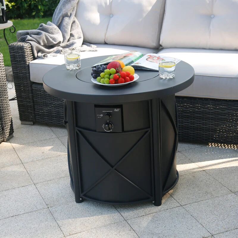 Round black fire pit table with fruit, perfect for comfortable social space