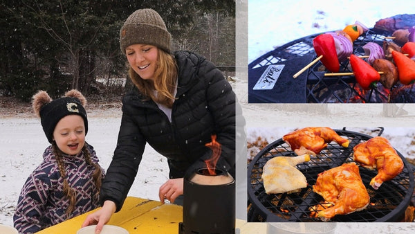 Maine Girl Outdoors and her daughter cooking oatmeal on a Bali Outdoors tabletop smokeless fire pit in the snow